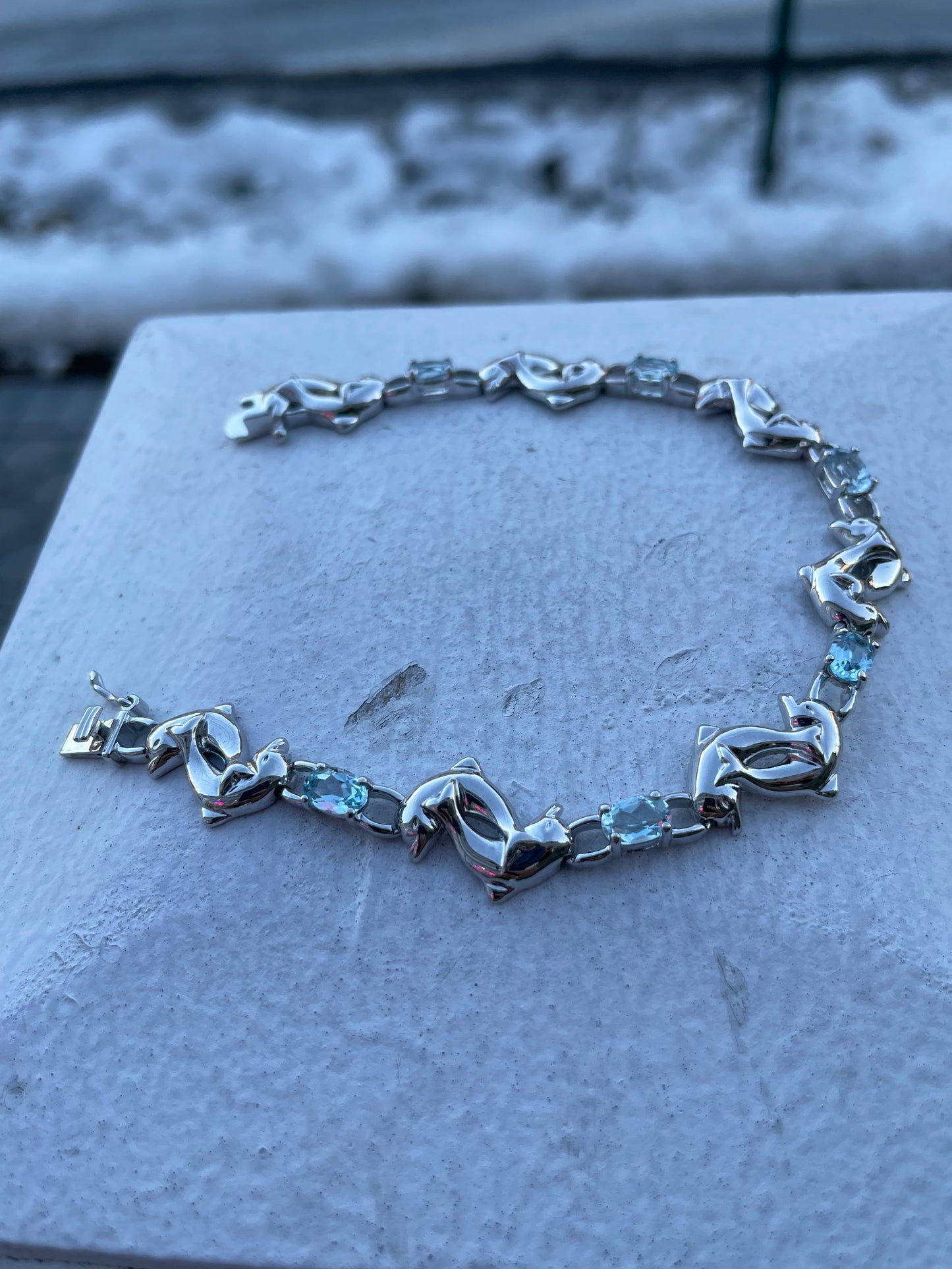 925 Silver Playful Dolphins Blue Topaz Bracelet 7.25”