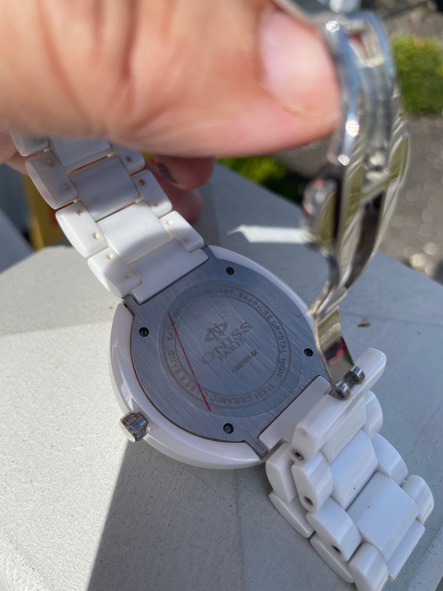 Ladies Oniss Paris White Ceramic Green Face Curved Oval Watch Model ON609-M