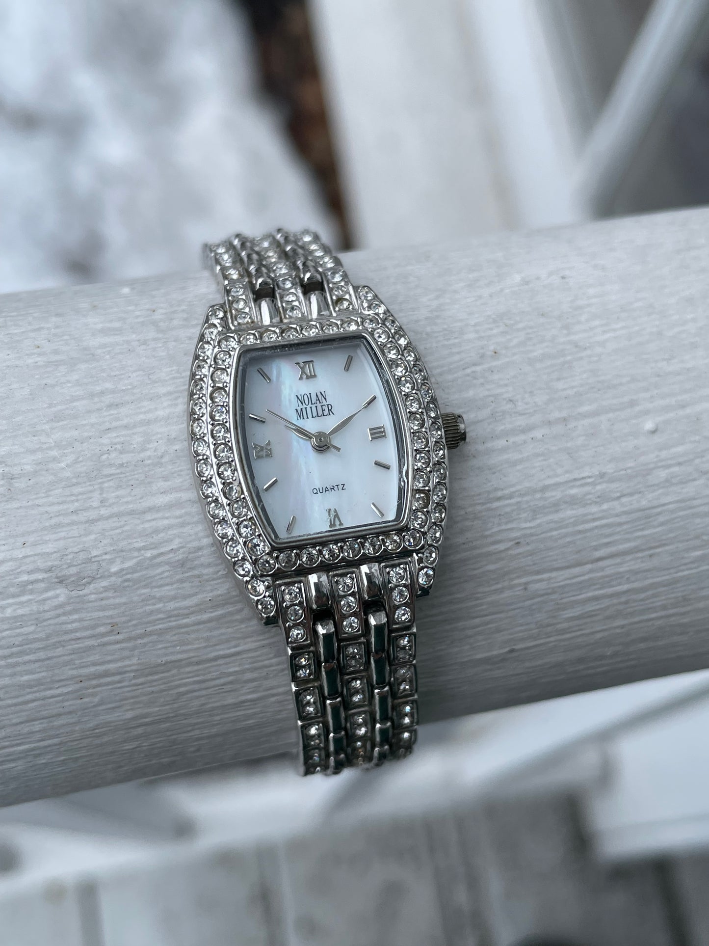 Ladies Nolan Miller Sparkling Mother of Pearl Stainless Steel Watch (K38)