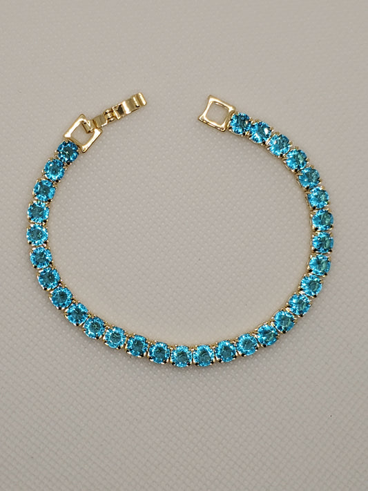 Stainless Steel Yellow Vermeil Synthethic Caribbean Blue Topaz Tennis Bracelet