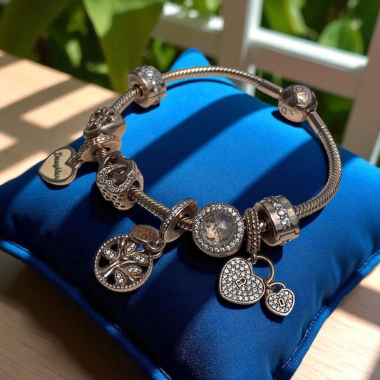 Preowned Pandora Rose Gold 7.5” Bracelet With Charms