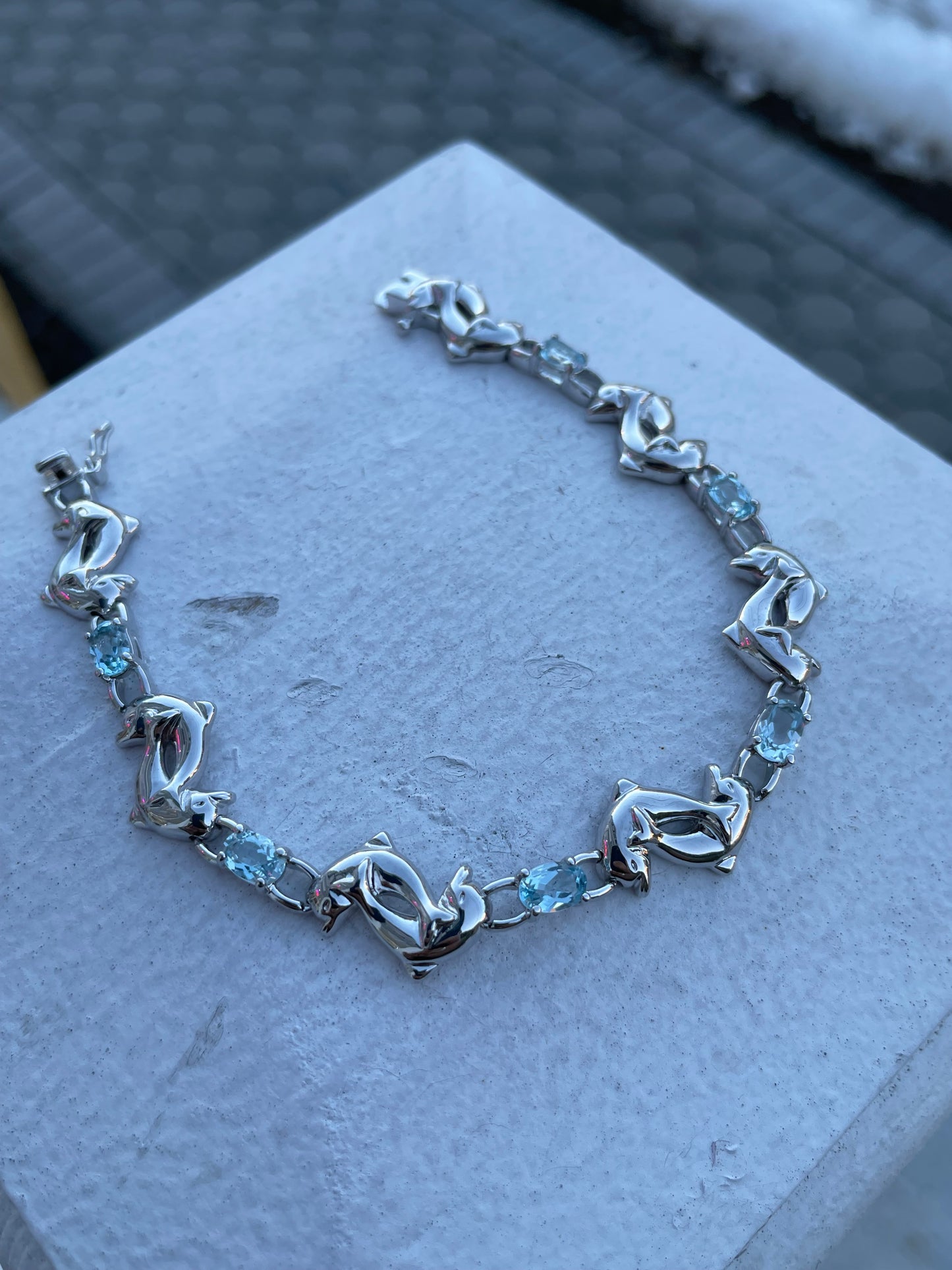 925 Silver Playful Dolphins Blue Topaz Bracelet 7.25”