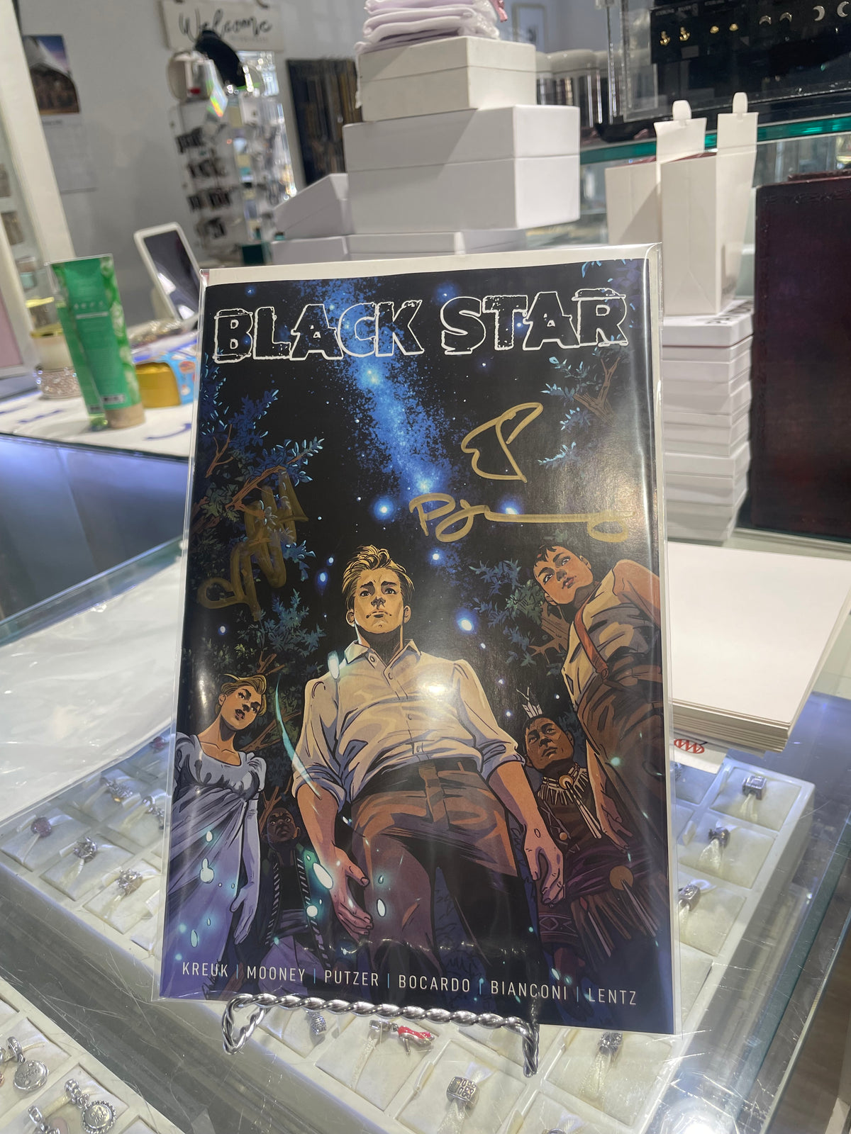 Signed x3 Black Star #1 Madwoman’s Library Exclusive Variant Cover signed by Kreuk, Mooney, and Putzer
