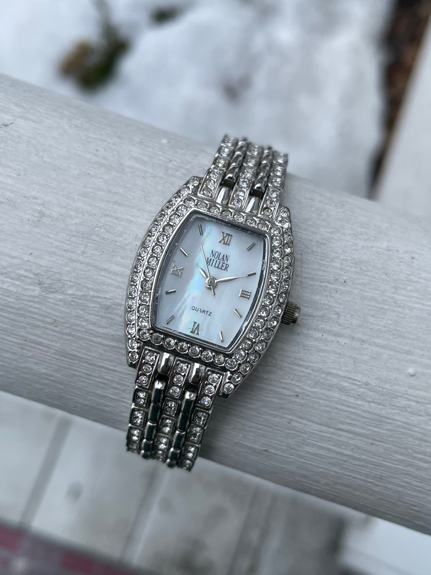 Ladies Nolan Miller Sparkling Mother of Pearl Stainless Steel Watch (K38)