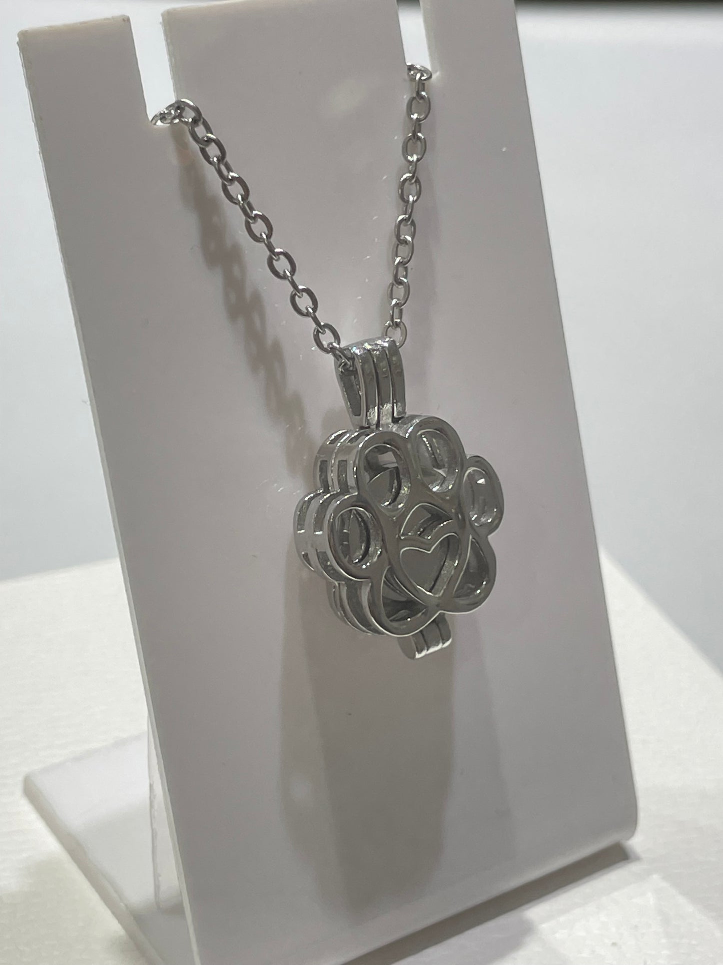 Stainless steel paw print urn necklace