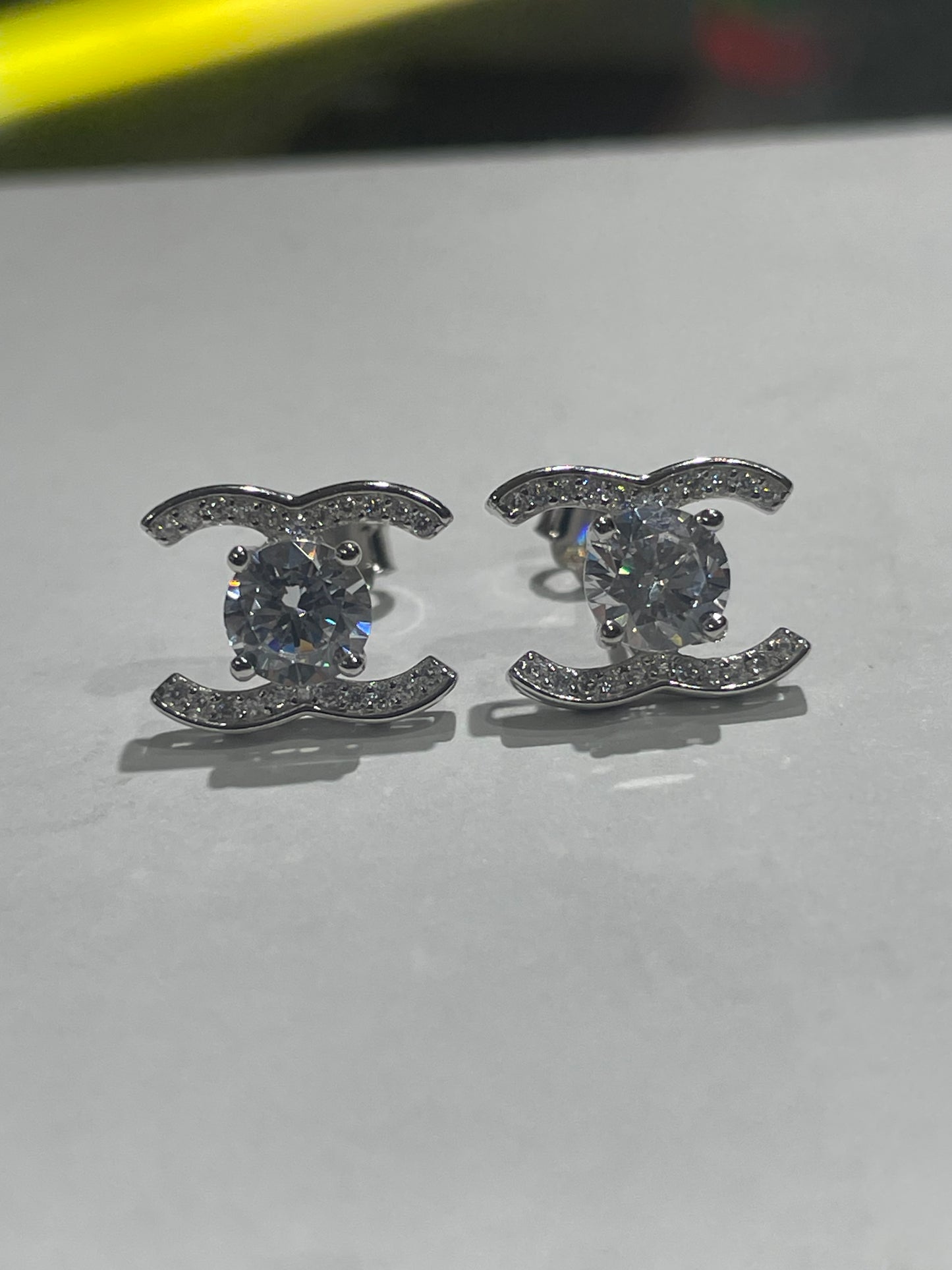 925 Sterling Silver Sparkling Petite Chanel Logo CC Stud Earrings