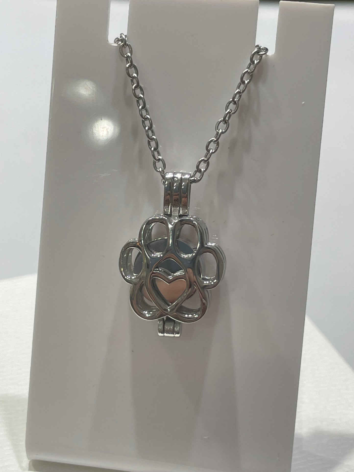 Stainless steel paw print urn necklace