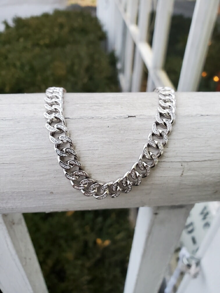 925 Sterling Silver Cuban Link Bracelet w/ Pave’ Cz stones.