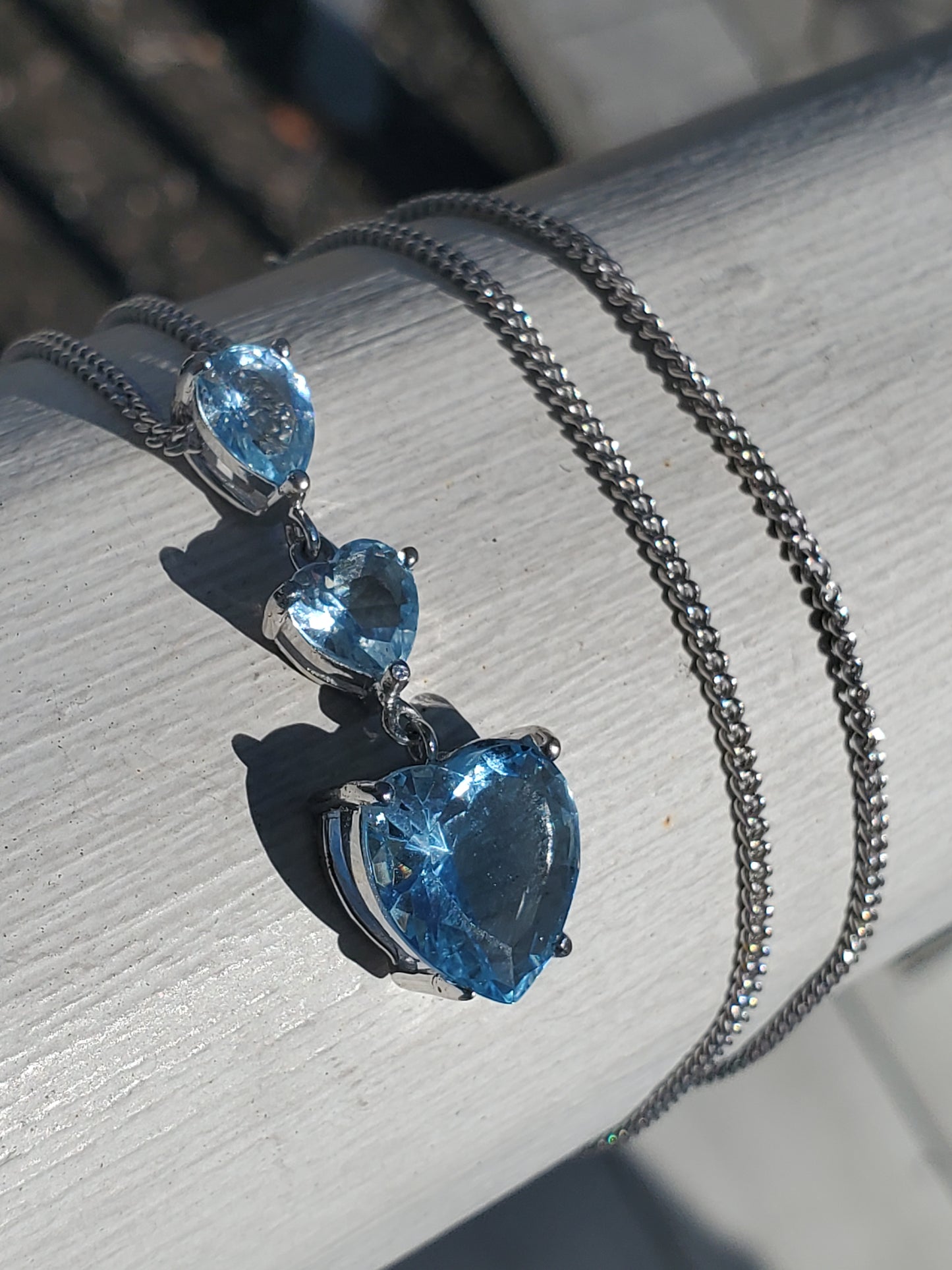 925 Sterling Silver "Ice Queen" 3-Tier Blue Topaz Heart Drop Necklace